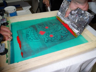 Silkscreen frame with ink and printed design